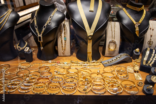Various gold and silver jewelry on display at jewelry store in a market in Tripoli, Lebanon