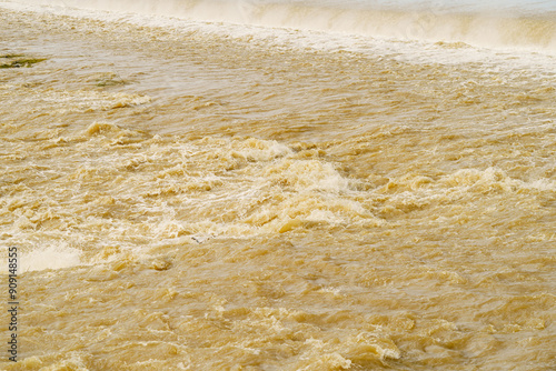 A river channel in northeast China that is discharging floodwaters during the rainy season in July