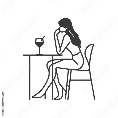 Woman Sitting at a Table with a Drink