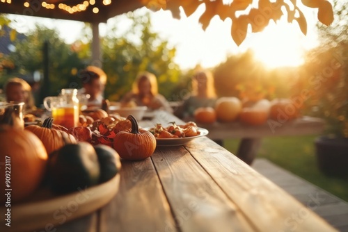 Thanksgiving table setting outdoors with pumpkins and candles. Autumn home decoration	