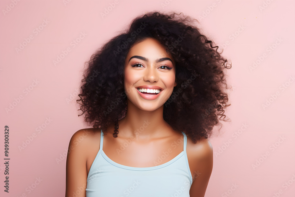 beautiful African American female model smiling looking into the camera on pink clear background, portrait of a woman smiling beautiful African American female model smiling looking into the camera on pink clear background, portrait of a woman smiling