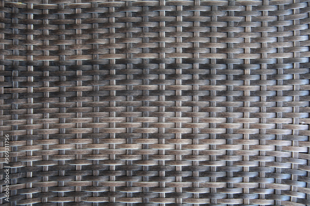 Woven Wicker background texture in brown, grey, tan neutral colors Woven Wicker background texture in brown, grey, tan neutral colors