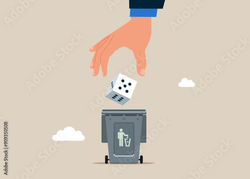 Frustrated businessman throw dice into the waste basket. Investment risk, stock trader, gambling, uncertainty, possibility of losing money or make a profit from investment concept. 