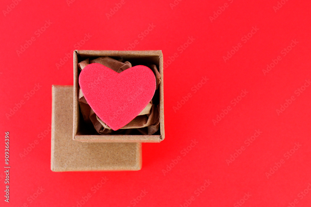 Heart carefully packed in a handmade gift box Heart carefully packed in a handmade gift box