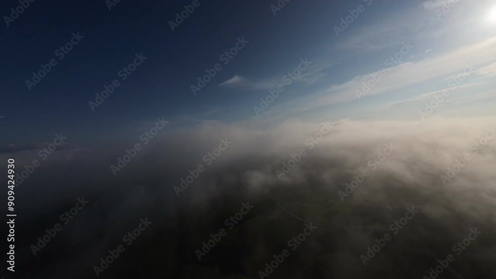 Flying through a gorgeous cloudscape on a fresh summer morning in the mountains Flying through a gorgeous cloudscape on a fresh summer morning in the mountains
