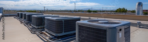 Roofmounted Condenser Unit Releases Heat to Cool Air in HVAC Systems  photo