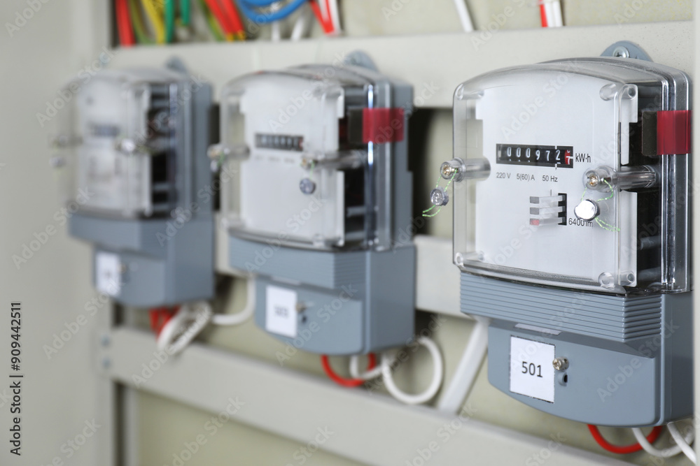Electric meters and wires in fuse box. Energy measuring device Electric meters and wires in fuse box. Energy measuring device