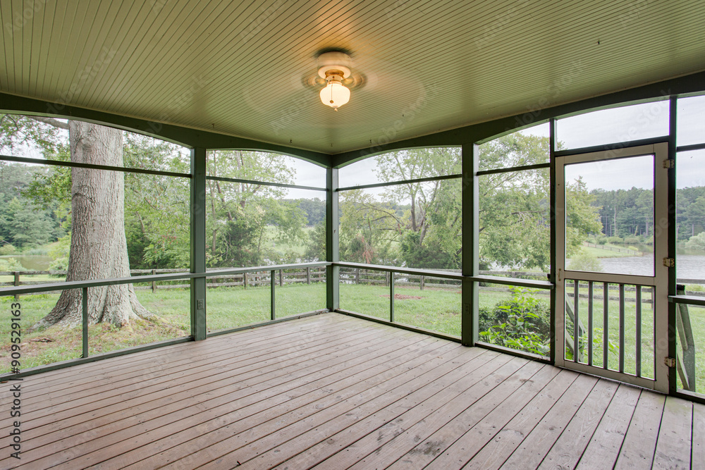 Screened Porch With Wooden Floor Overlooking Scenic Landscape And Nature Screened Porch With Wooden Floor Overlooking Scenic Landscape And Nature