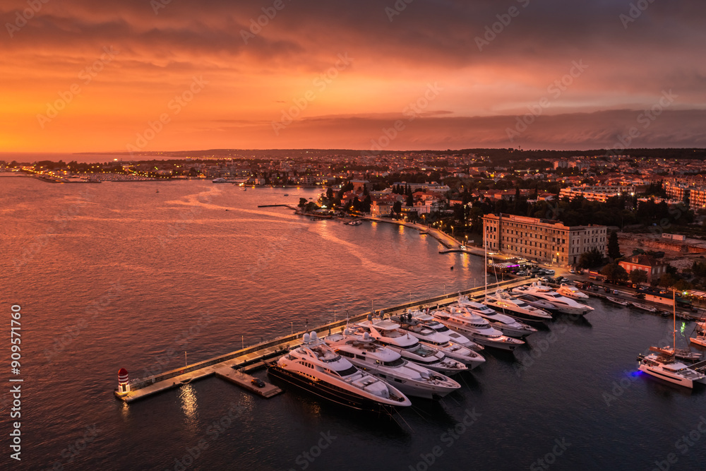 Φωτογραφία Zadar, Croatia - Aerial view of a beautiful golden sunset above the city of Zadar with yacht marina on a summer afternoon