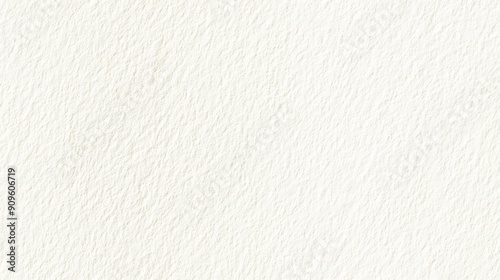 A textured off-white background ideal for various design projects and artistic applications. photo