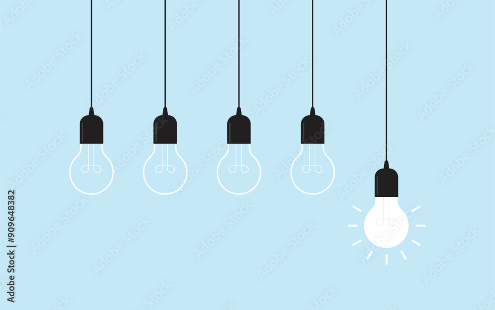 Hanging light bulbs with one glowing on blue background. Concept of idea Hanging light bulbs with one glowing on blue background. Concept of idea