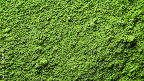 Wide angle of a vibrant green matcha powder texture background 