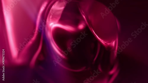 Purple pink shiny wallpaper 3D animation loop background with fluid rose oil bubbles and shiny light leaks. Posh luxury wallpaper showcase backplate as cosmetic and sensual Valentine's Day backdrop.