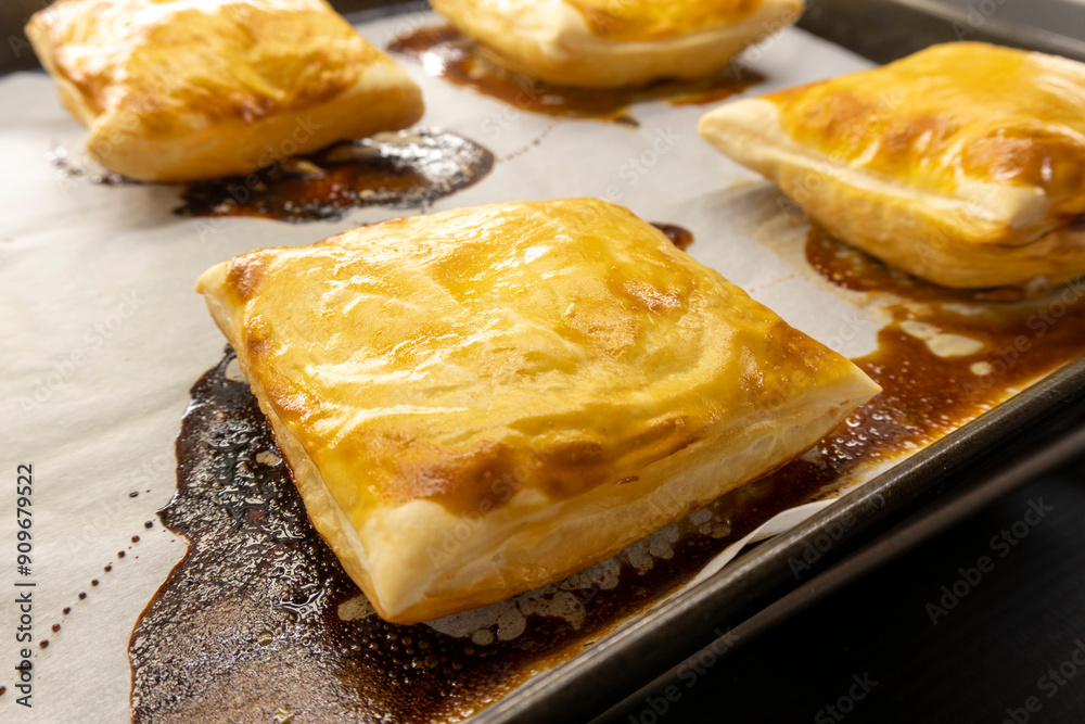 pastry made from puff pastry with apples and seeds. Dessert. food concept pastry made from puff pastry with apples and seeds. Dessert. food concept
