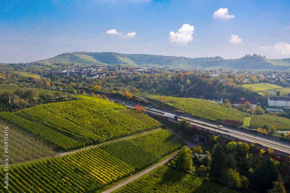 Scenic vineyards on the hills and the autobahn (highway) from Fellbach to Stuttgart. Autumn morning scenic landscape in Untertürkheim, Baden-württemberg, Germany.