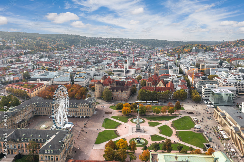 Beautiful autumn aerial skyline cityscape of Stuttgart Mitte, Baden-württemberg, Germany. Ferris wheel and Jubiläumssäule at Schlossplatz in front of Neues schloss