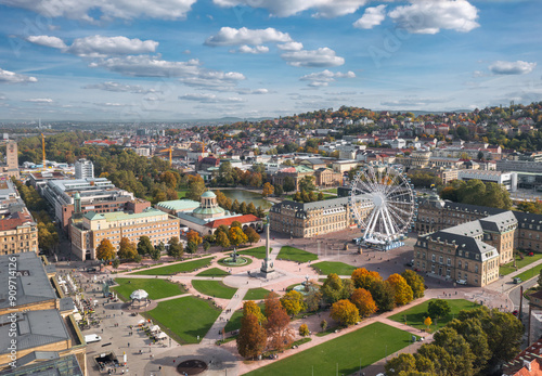 Obraz na płótnie Beautiful autumn skyline cityscape of Stuttgart Mitte, Baden-württemberg, Germany at sunset. Ferris wheel and Jubiläumssäule at Schlossplatz in front of Neues schloss w salonie