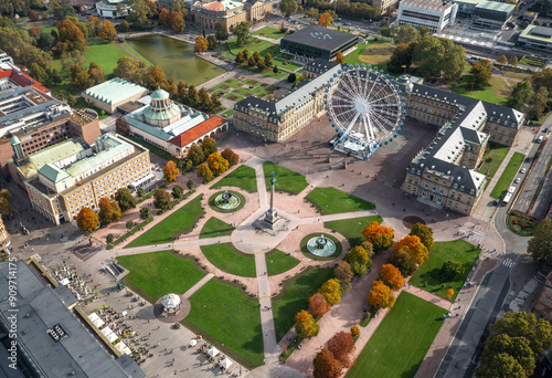 Obraz na płótnie Beautiful autumn aerial view of Stuttgart Mitte, Baden-württemberg, Germany. Ferris wheel and Jubiläumssäule at Schlossplatz in front of Neues schloss w salonie