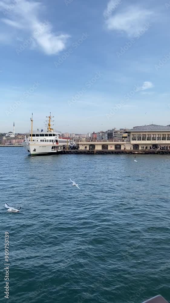 Istanbul, Turkey - 26 October 2021: Kadikoy Pier region of Istanbul. Passengers board the ferry at Kadıköy Ferry Terminal. sstkVertical clip. vertical video. Istanbul, Turkey - 26 October 2021: Kadikoy Pier region of Istanbul. Passengers board the ferry at Kadıköy Ferry Terminal. sstkVertical clip. vertical video.