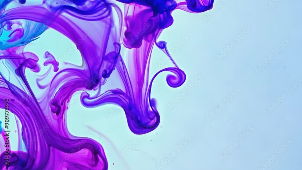 Colorful swirls of purple and blue ink merge in water, creating captivating patterns that showcase fluidity and artistry as they blend harmoniously, drawing viewers' attention. Colorful swirls of purple and blue ink merge in water, creating captivating patterns that showcase fluidity and artistry as they blend harmoniously, drawing viewers' attention.