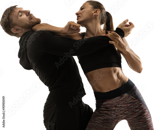 Foto Woman practicing self-defense punches with man, isolated on transparent background