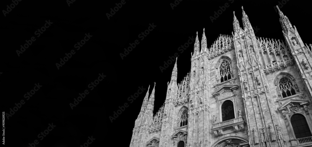 Naklejka premium The famous Milan Cathedral, a rare and beautiful sample of gothic architecture in Italy (Black and White with copy space)