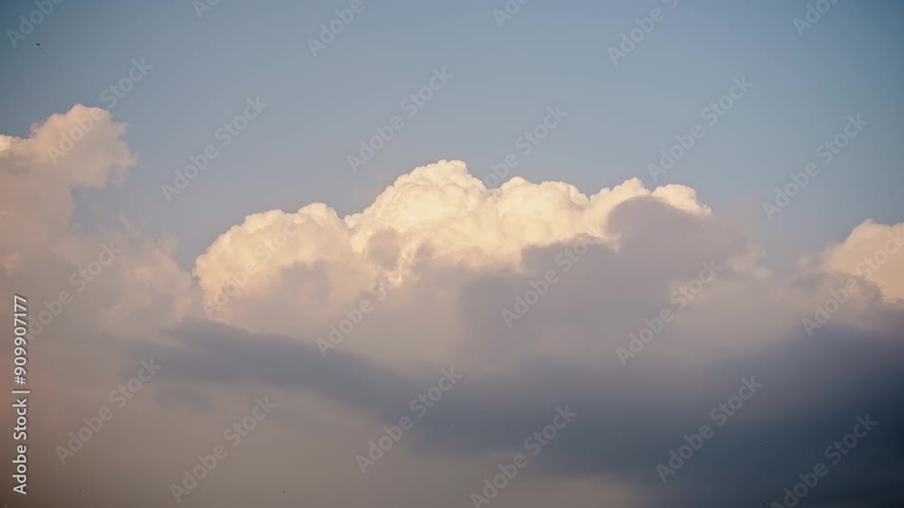 Dramatic Sunset Sky Clouds Background, Colourful Big Stormy Beautiful Storm Clouds in the Sky with Copy Space for Text Dramatic Sunset Sky Clouds Background, Colourful Big Stormy Beautiful Storm Clouds in the Sky with Copy Space for Text