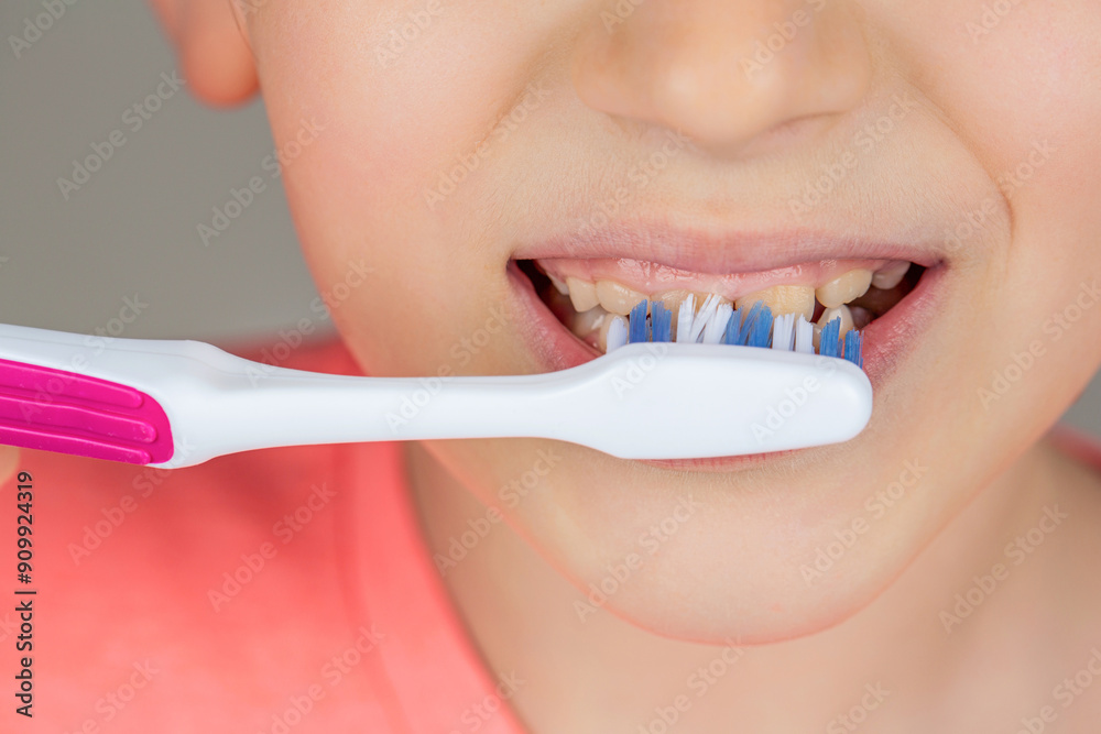 Cute little boy holding toothbrush with paste, closeup. Handsome boy with holds brush teeth. Dental hygiene. Little kid brushing her teeth. Kid boy brushing teeth. Boy toothbrush white toothpaste Cute little boy holding toothbrush with paste, closeup. Handsome boy with holds brush teeth. Dental hygiene. Little kid brushing her teeth. Kid boy brushing teeth. Boy toothbrush white toothpaste