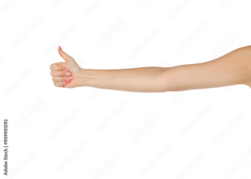 Female outstretched hand with thumb up on a white background Female outstretched hand with thumb up on a white background