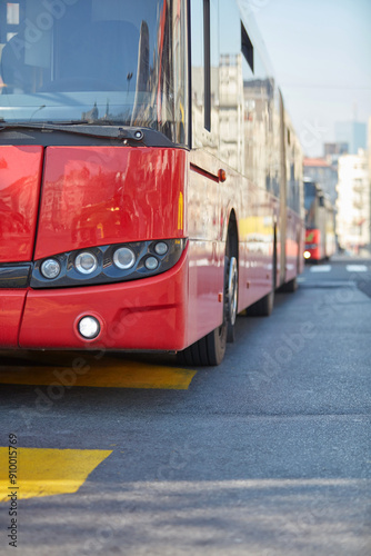 Public transportation bus in urban surroundings.