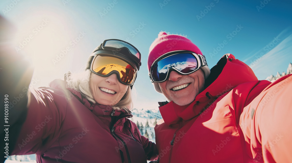 Senior skier couple taking a selfie