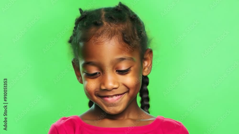 A joyful child with braided hair smiles warmly while focusing on a task, showcasing happiness and innocence in a vibrant setting A joyful child with braided hair smiles warmly while focusing on a task, showcasing happiness and innocence in a vibrant setting