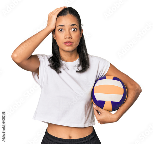 Young Filipino woman with volleyball being shocked, she has remembered important meeting.