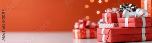 Colorful Wrapped Gifts on an Orange Background