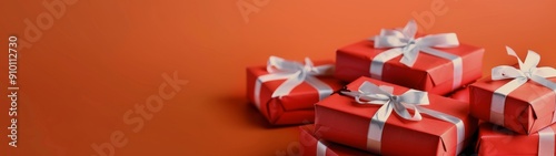 Colorful Wrapped Gifts on an Orange Background