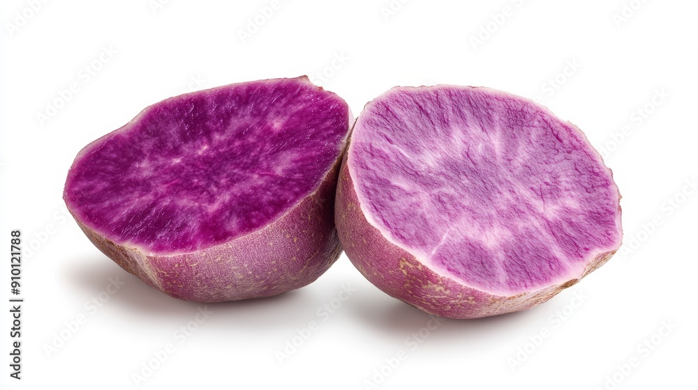Halved purple yam revealing its vibrant violet interior, detailed texture of the flesh and skin. Isolated on a crisp white background Halved purple yam revealing its vibrant violet interior, detailed texture of the flesh and skin. Isolated on a crisp white background