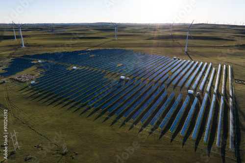solar power station and wind power station in sunny sky