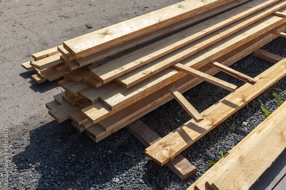 Stacked wooden boards, outdoor storage Stacked wooden boards, outdoor storage