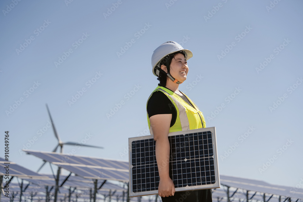female technician working in solar power station
