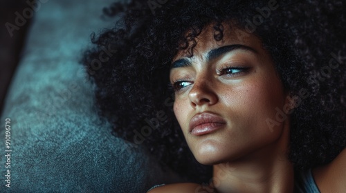 A portrait of a woman with her eyes shut, great for use in profiles or focusing attention