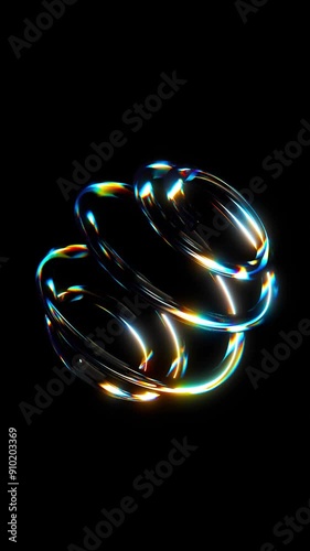 3D animation of geometric shapes with dispersion rainbow color spectrum prism effect on isolated black background