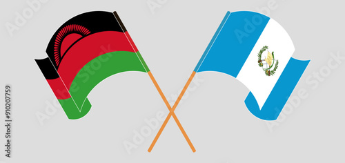 Crossed and waving flags of Malawi and Republic of Guatemala