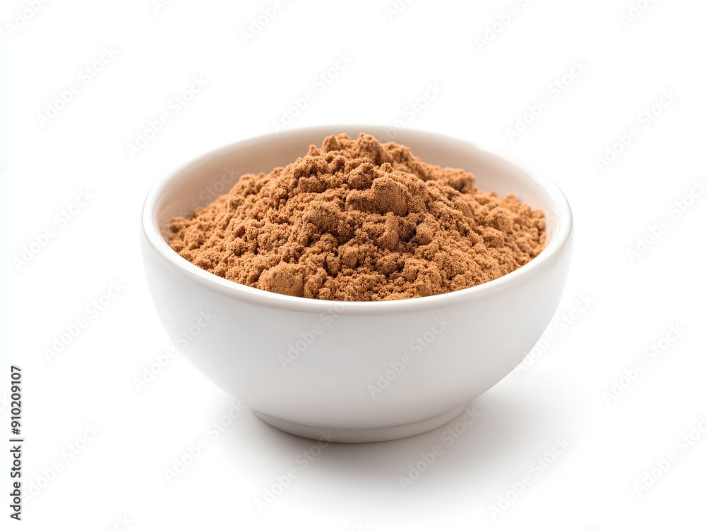 ground cinnamon in a bowl ground cinnamon in a bowl