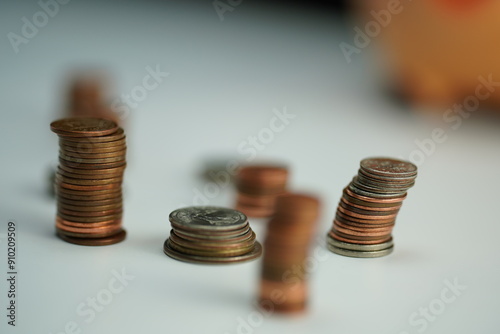 Wallpaper Mural several piles of coins of different currencies as a savings concept Torontodigital.ca