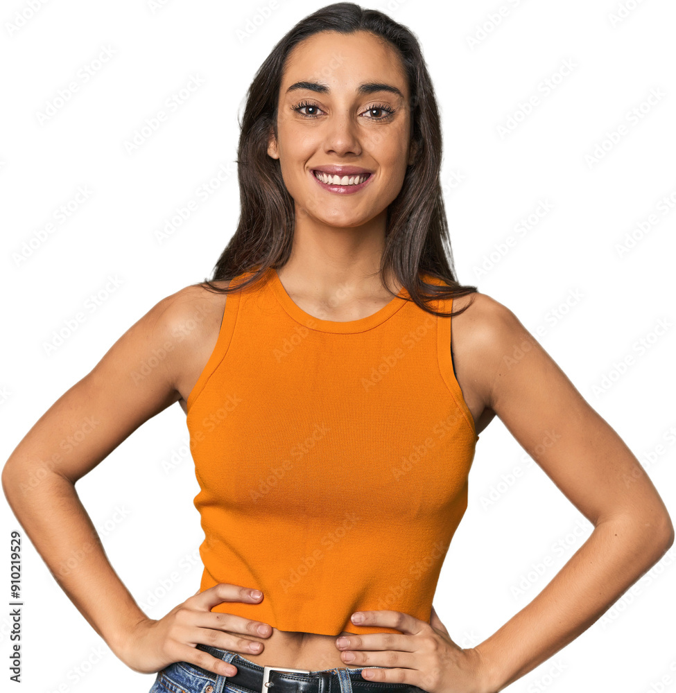Hispanic young woman confident keeping hands on hips.