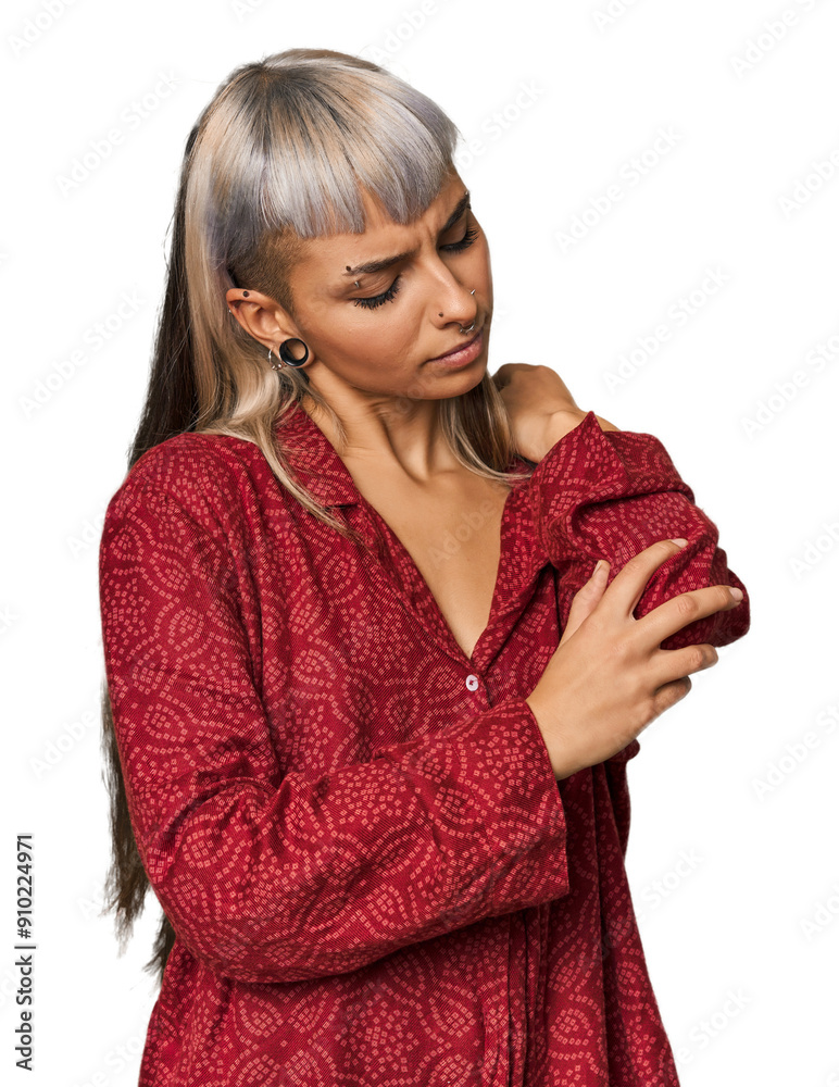 Young caucasian young woman in studio massaging elbow, suffering after a bad movement. Young caucasian young woman in studio massaging elbow, suffering after a bad movement.