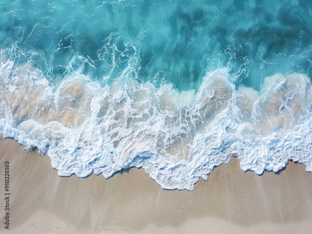 A topdown view of a clear blue wave meeting the sandy shore, creating a seamless blend of water and sand, with gentle ripples and foam, evoking a sense of calm and serenity A topdown view of a clear blue wave meeting the sandy shore, creating a seamless blend of water and sand, with gentle ripples and foam, evoking a sense of calm and serenity