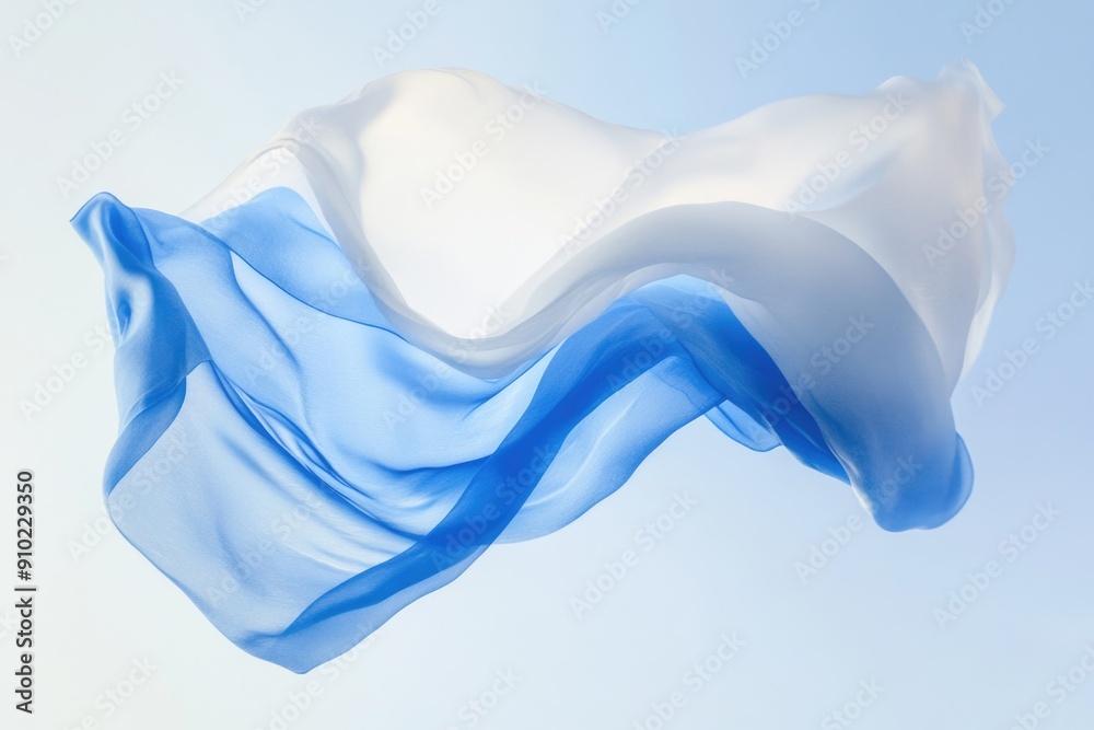 A blue and white cloth soaring through the air, with a sense of movement and freedom A blue and white cloth soaring through the air, with a sense of movement and freedom