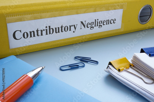Yellow folder with label contributory negligence.