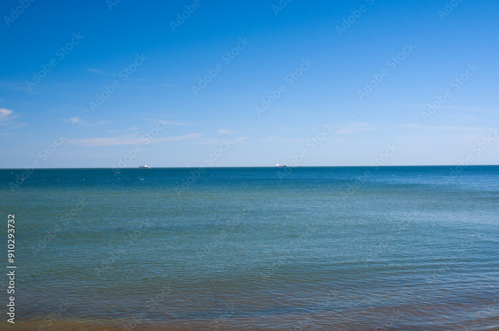 Tranquil landscape of bright blue sky and sea Tranquil landscape of bright blue sky and sea